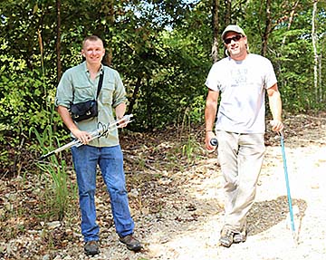 Dr. Bill Sutton and his student, Shawn Snyder, spend the day in the Tennessee woods collecting data on the threatened Western pygmy rattlesnake.