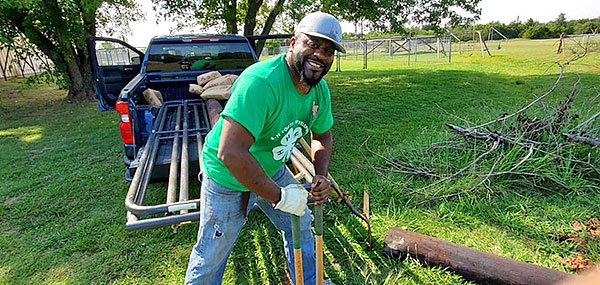 Jeremiah Wilson digs in the ground.