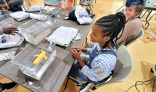 Student participates in activity.