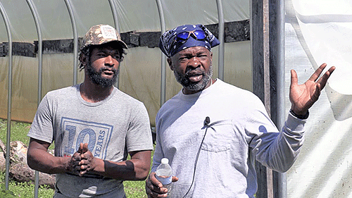 McDowell County Farms founder Jason Tartt speaks with farmer.