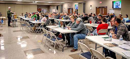 Kentucky Commissioner of Agriculture Jonathan Shell addresses a roomful of people.