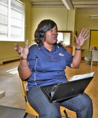 Millicent Price speaks to clients.