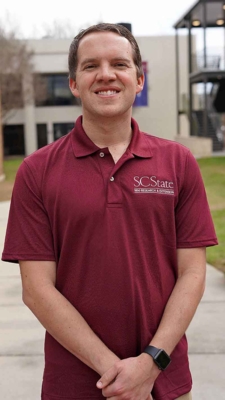 Headshot of Dr. Brandon Huber.