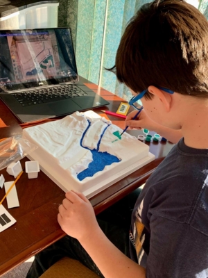 Water Camp student works virtually on project.