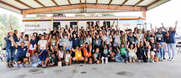 Large group of youth participants and staff.