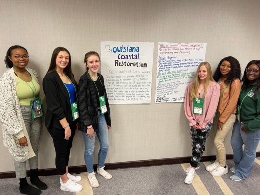 Youths develop the Louisiana Coastal Restoration community action plan to combat coastal erosion.