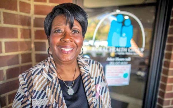 Patricia Peele stands in front of the Rural Health Group office in Roanoke Rapids.