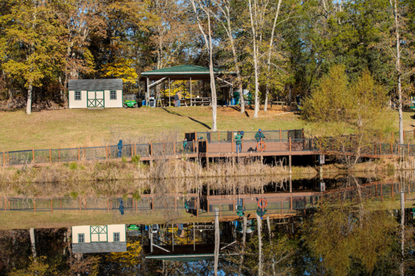 Attendees of the Environmental Education and Research Center’s fall open house fish and do other activities.