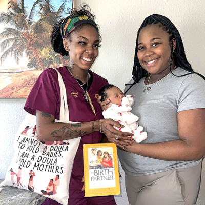 Jewel Rollins with baby and mother.