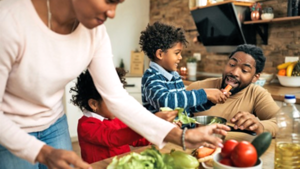 Family at the table with food.