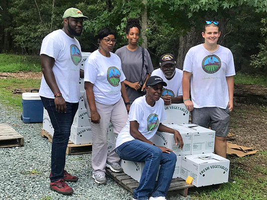 Delpine Sellars and volunteers help turn an old farmstead and plantation into a thriving community farm and gathering place.