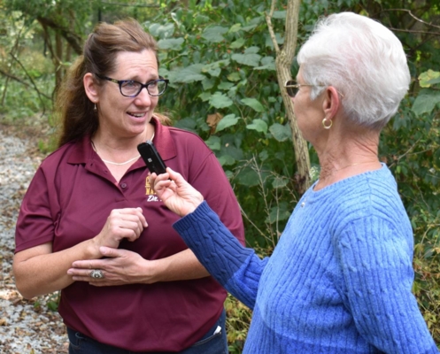 An individual interviews Dr. Cindy Folck.