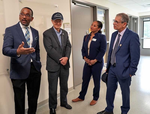 Drs. Douglas LaVergne, John Yang, Michelle Samuel-Foo and Manjit Misra discuss the Dickinson Research Center’s state-of-the-art technology.