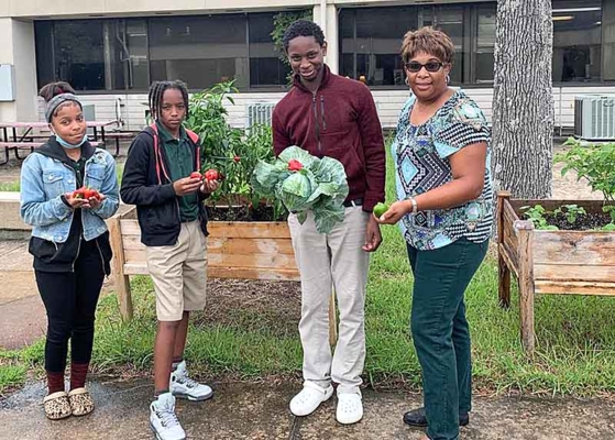 Dr. Karleah Harris with students.