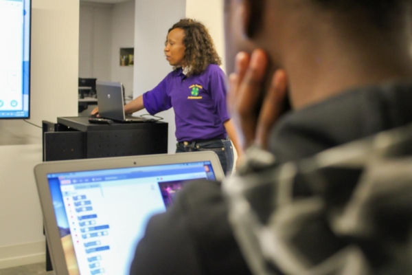 Extension specialist teaches a class of students.