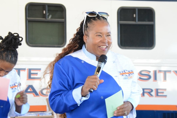Dr. Janine P. Woods speaking.