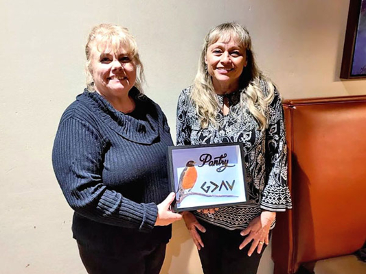 Robin Lock with community member.