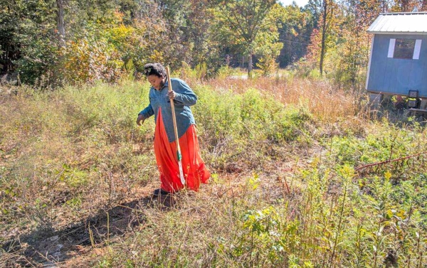 Woman walking the land.