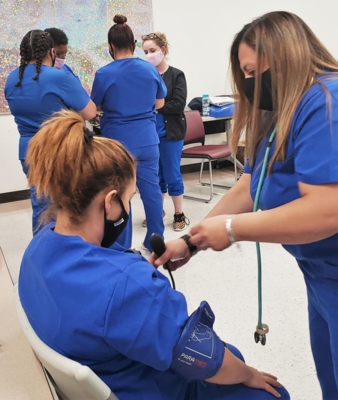 Group participates in a five-week certified nursing assistant program.