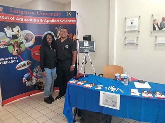 Northeast Family Medical Clinic provides information at a conference.