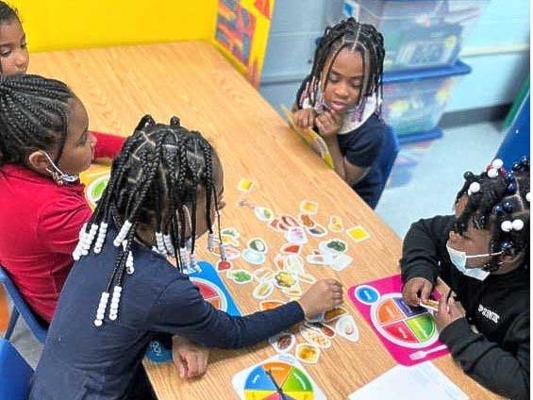 Students with H. Fletcher Brown Boys and Girls Club.