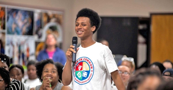 Student speaks to crowd.