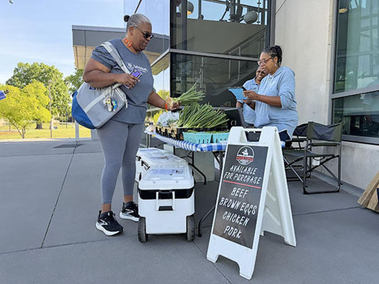 Willimena Isler shops at the Fresh & Local Market at N.C. A&T.