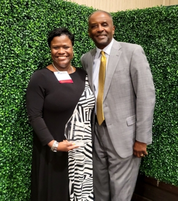 Michelle Eley, Ph.D., holds her 2024 Trailblazer Award with M. Ray McKinnie, Ph.D., associate dean and administrator of Cooperative Extension.