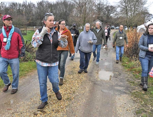 A group of agricultural stakeholders tour Century Farm.