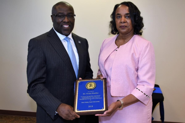 FVSU President Dr. Paul Jones recognizes Dr. Vivian Fluellen for her many years of service.