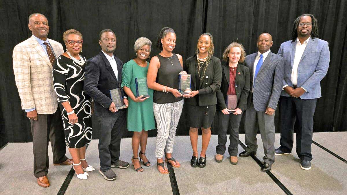 Group photo of award recipients and administrators.