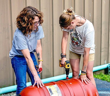 Liz Moss and stormwater participant.