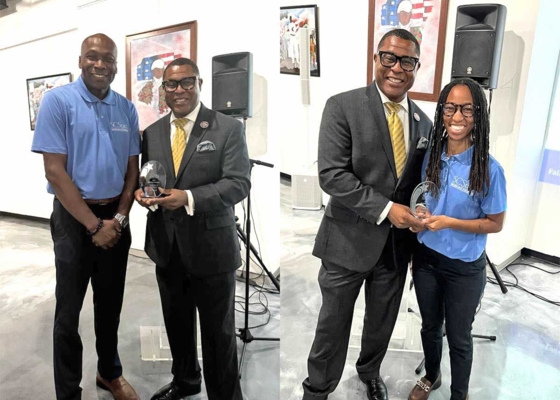 Michael Fairwell and Daisha Finley receive awards.