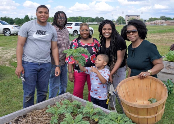 Group with garden bed.
