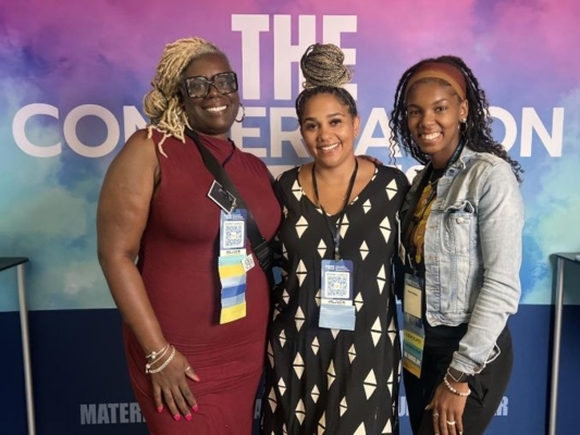 Extension program leader with two educators and doulas.