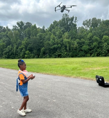 Student operates a drone.